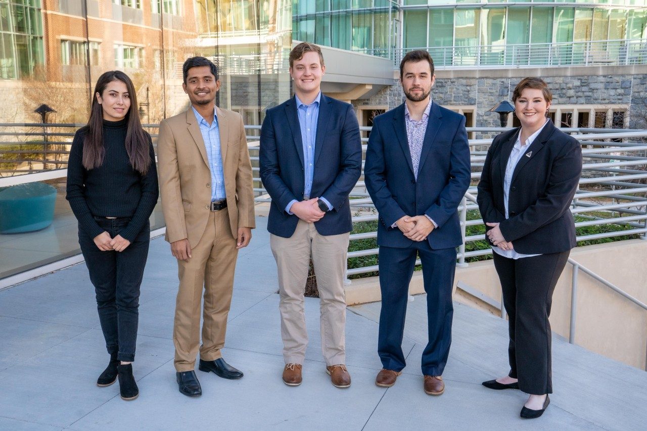 Members of team AdenoGuard presented an idea for an adenovirus-based vaccine that allows the immune system to recognize and respond to the highly addictive opioid fentanyl. Making the pitch were Nazia Bano, Sahitya Biswas, Walt Tatera, Colin Kelly, and Paige van de Vuurst.