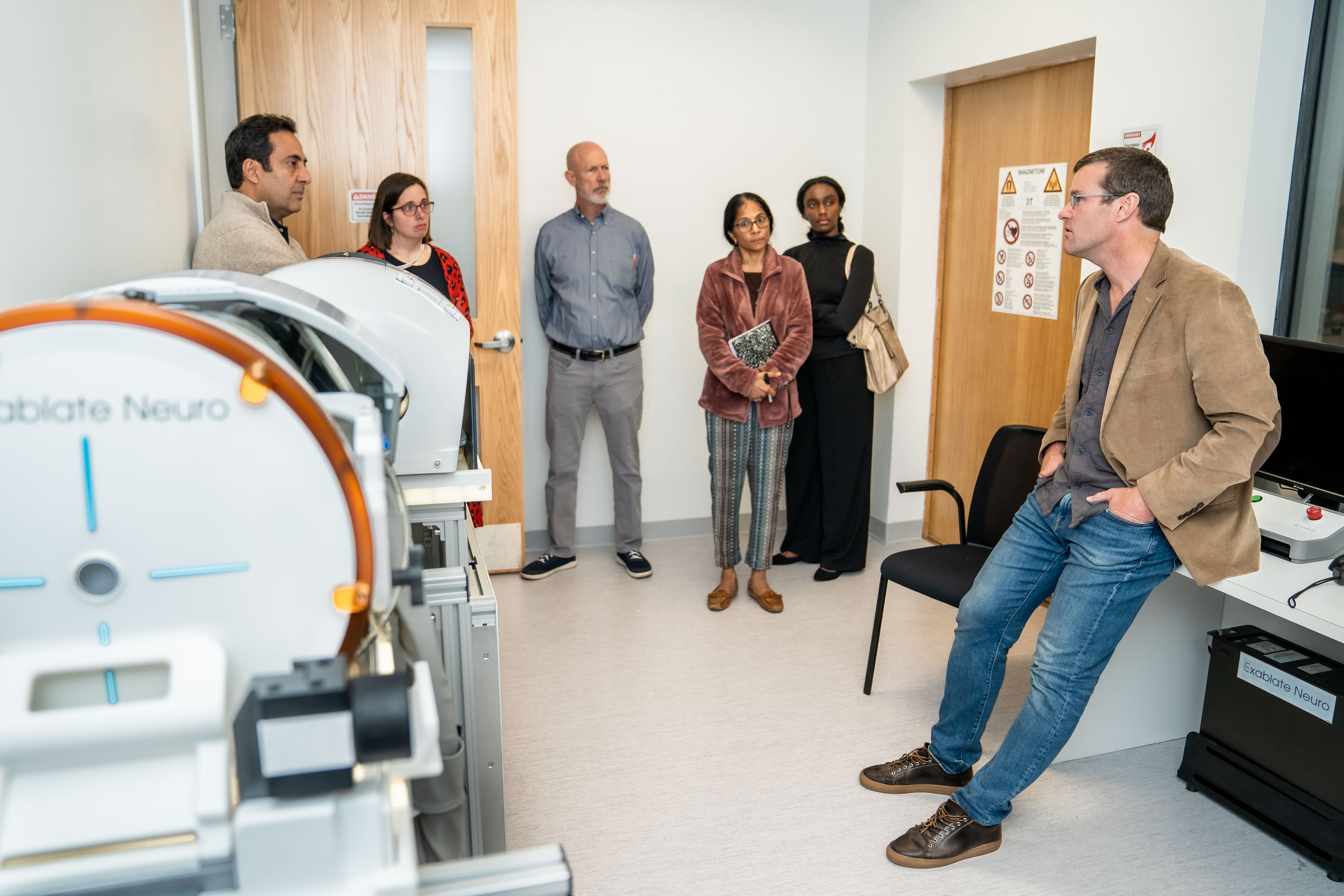 Wynn Legon (right), an assistant professor of the Fralin Biomedical Research Institute and the School of Neuroscience of the College of Science,  is at the forefront of research into the use of focused ultrasound to modulate human brain activity.