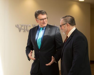 Michael Friedlander, executive director of the Fralin Biomedical Research Institute at VTC and Virginia Tech's vice president for Health Sciences and Technology (left) and Warren Bickel in earlier days at the institute. Friedlander recruited Bickel to join the institute shortly after it opened in 2010.