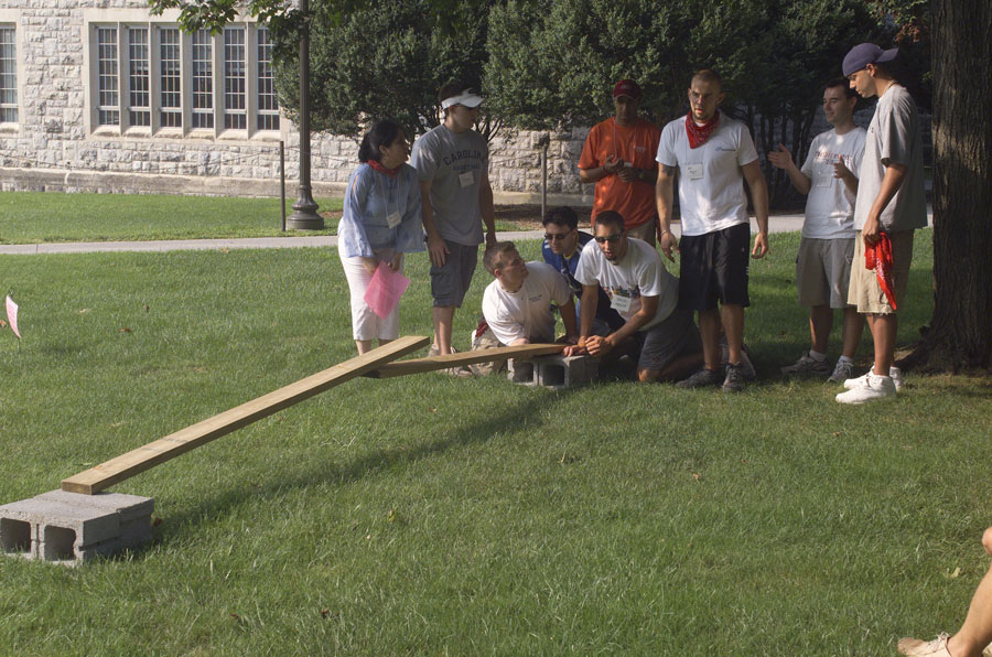 An MBA student team works on a Quest challenge.