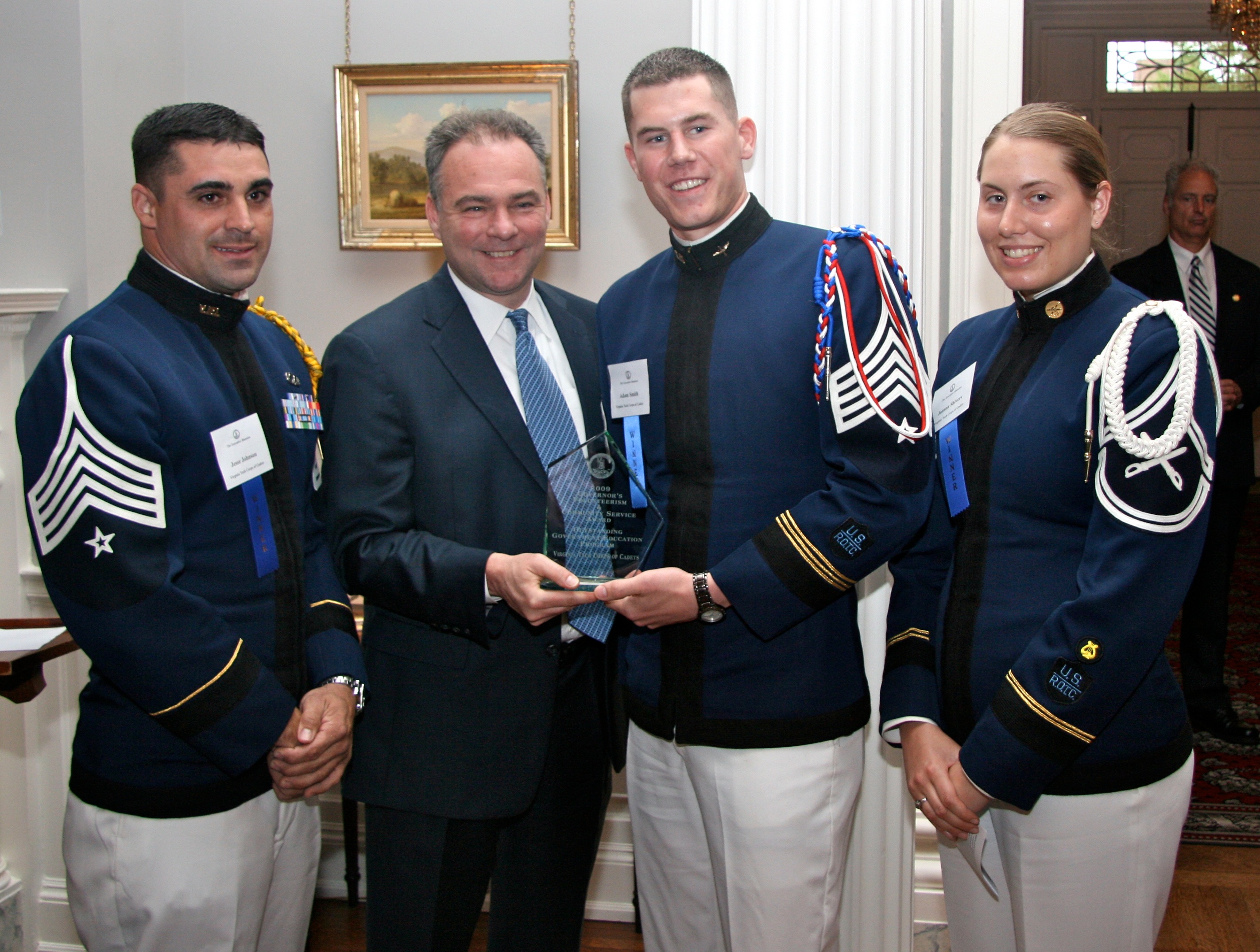 Receiving the award from Gov. Tim Kaine on behalf of the corps were Cadet Jesse Johnson, of Christiansburg, Va., a senior majoring in history in the College of Liberal Arts and Human Sciences, Cadet Adam Smith of Ashburn, Va., a senior majoring in mechanical engineering in the College of Engineering, and Cadet Joanna Shivers of Black Hawk, S.D., a junior majoring in biology in the College of Science.