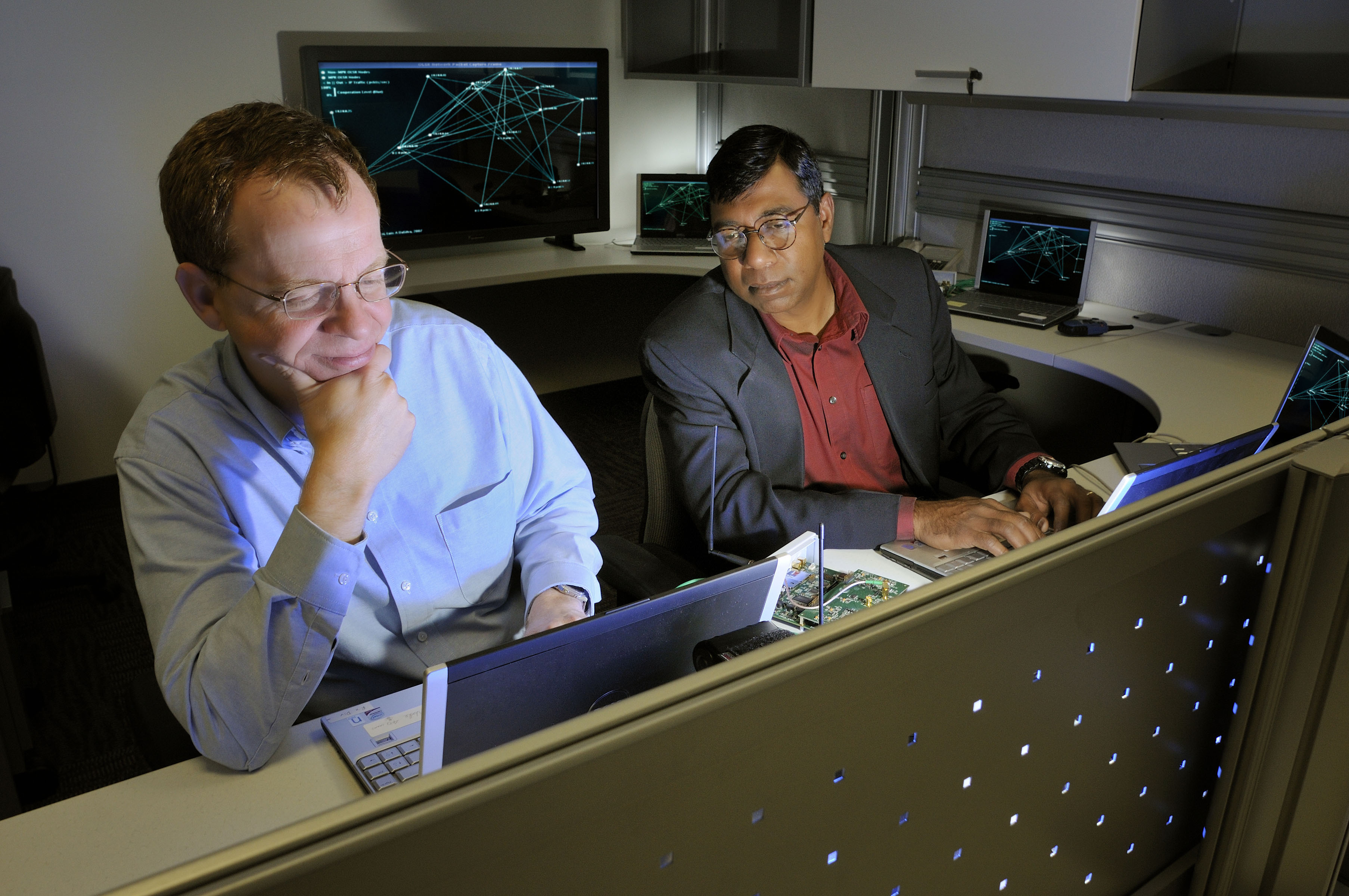 Jeff Reed (left) and Tamal Bose (right) director and co-director of Wireless@VT, will work with Ashwin Amanna, senior research associate, and other members of the Virginia Tech engineering faculty, as well as professors from Howard University to host one of the few Intelligence Community Centers of Academic Excellence (CAE) with an engineering thrust.