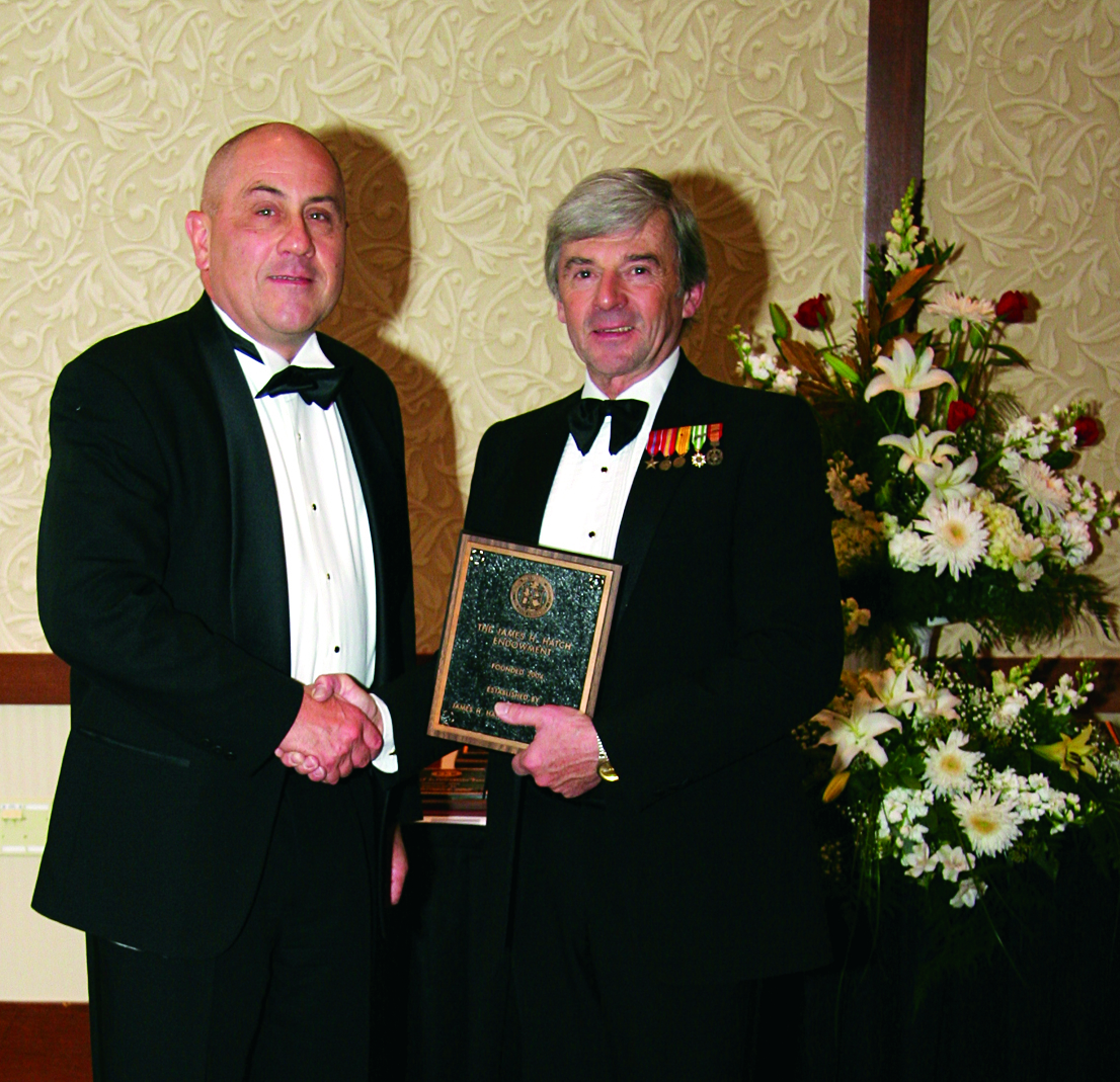 Jim Hatch (left) is thanked by Pamplin Dean Richard E. Sorensen for his contributions to the college at an event in 2007.