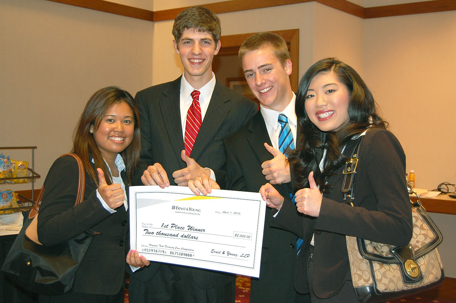 Diversity case competition winners, from left to right are Sunny Senedara, Sam Banks, Ian Hamre, and Denise Kee.