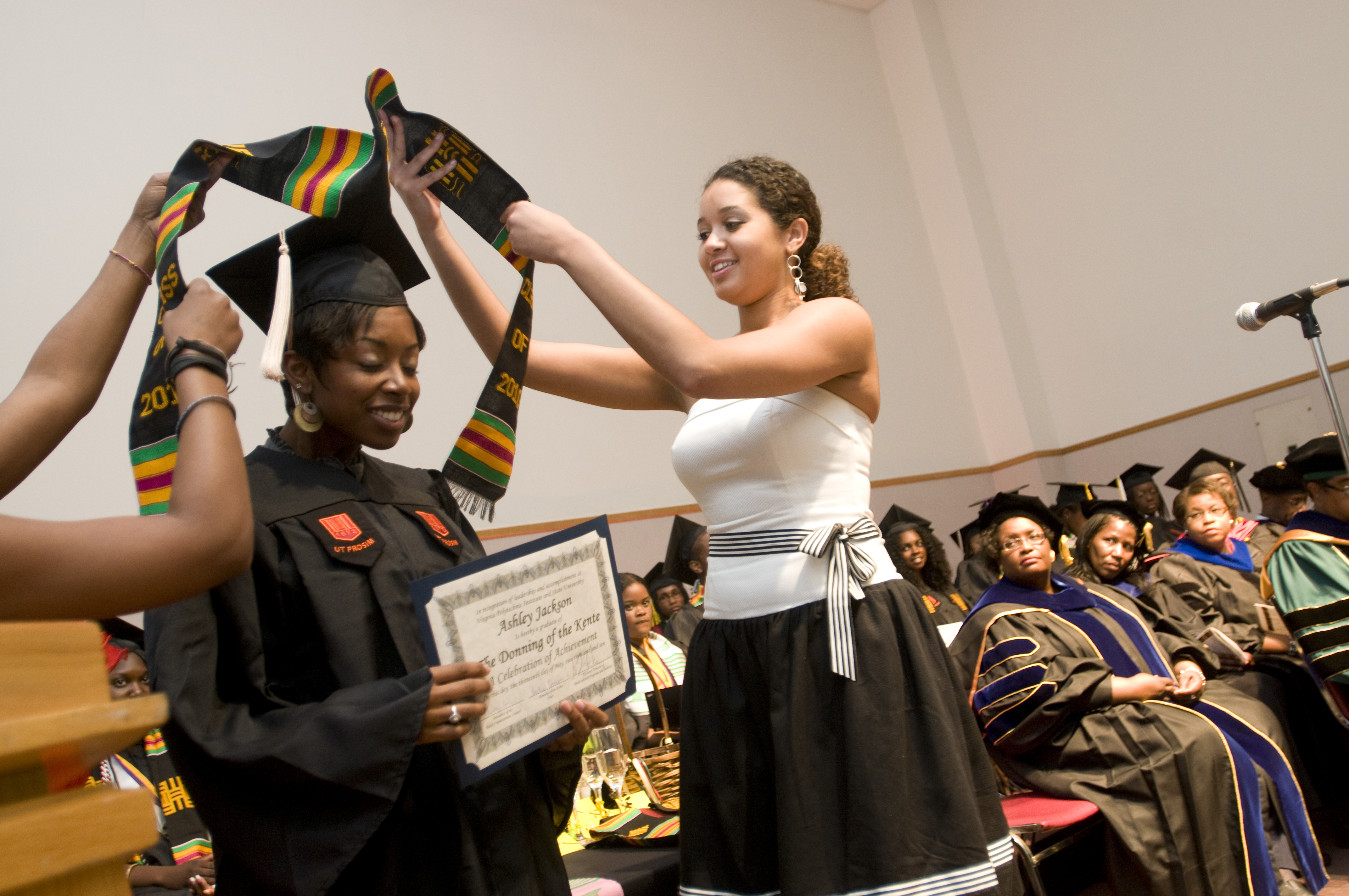 A graduate receives her stole at the spring 2010 ceremony.