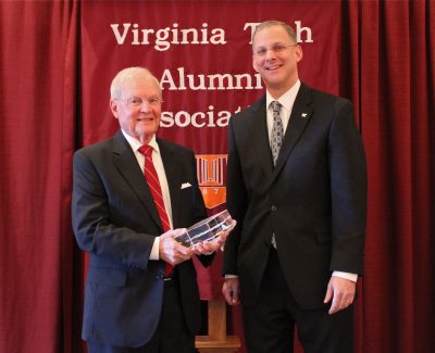 Alan Grant (right), dean of the College of Agriculture and Life Sciences, presents George E. Russell with an award as he is inducted in the Virginia Tech College of Agriculture and Life Sciences Hall of Fame.