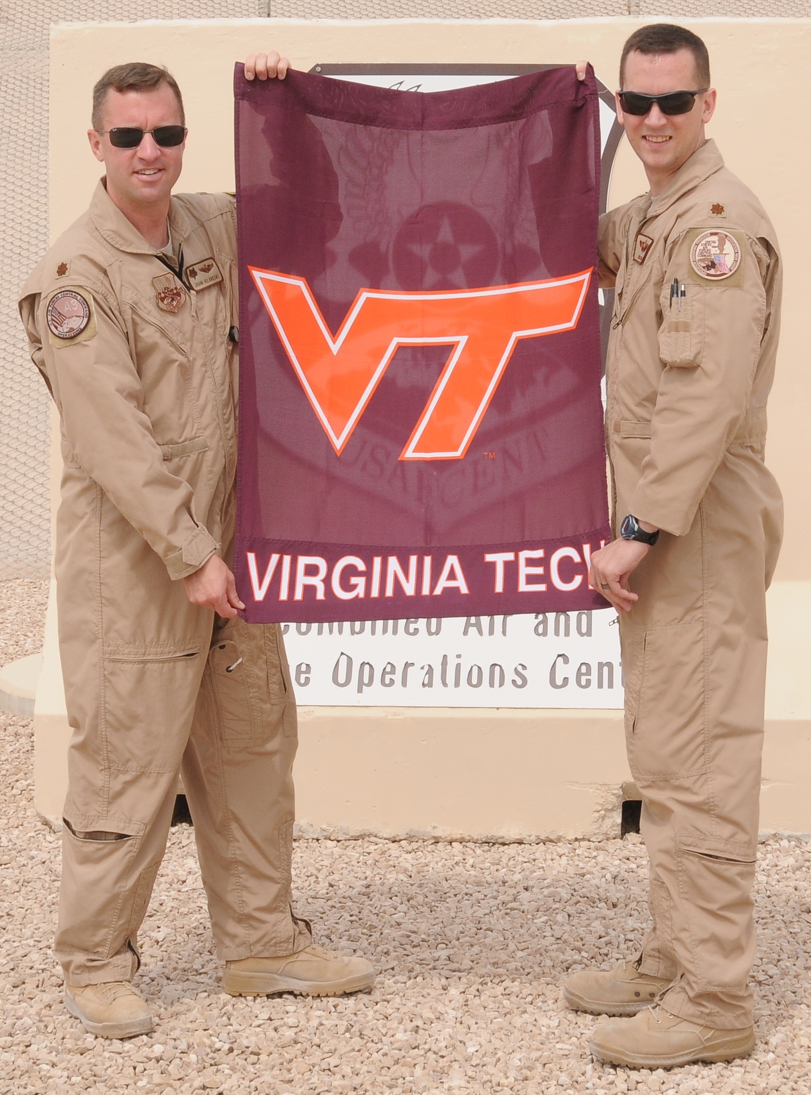 Maj. John Kilareski, U.S. Air Force, Virginia Tech Corps of Cadets Class of 1997 (left) and Capt. Chris Reid, U.S. Air Force, Virginia Tech Corps of Cadets Class of 2000 (right) in their deployed location.