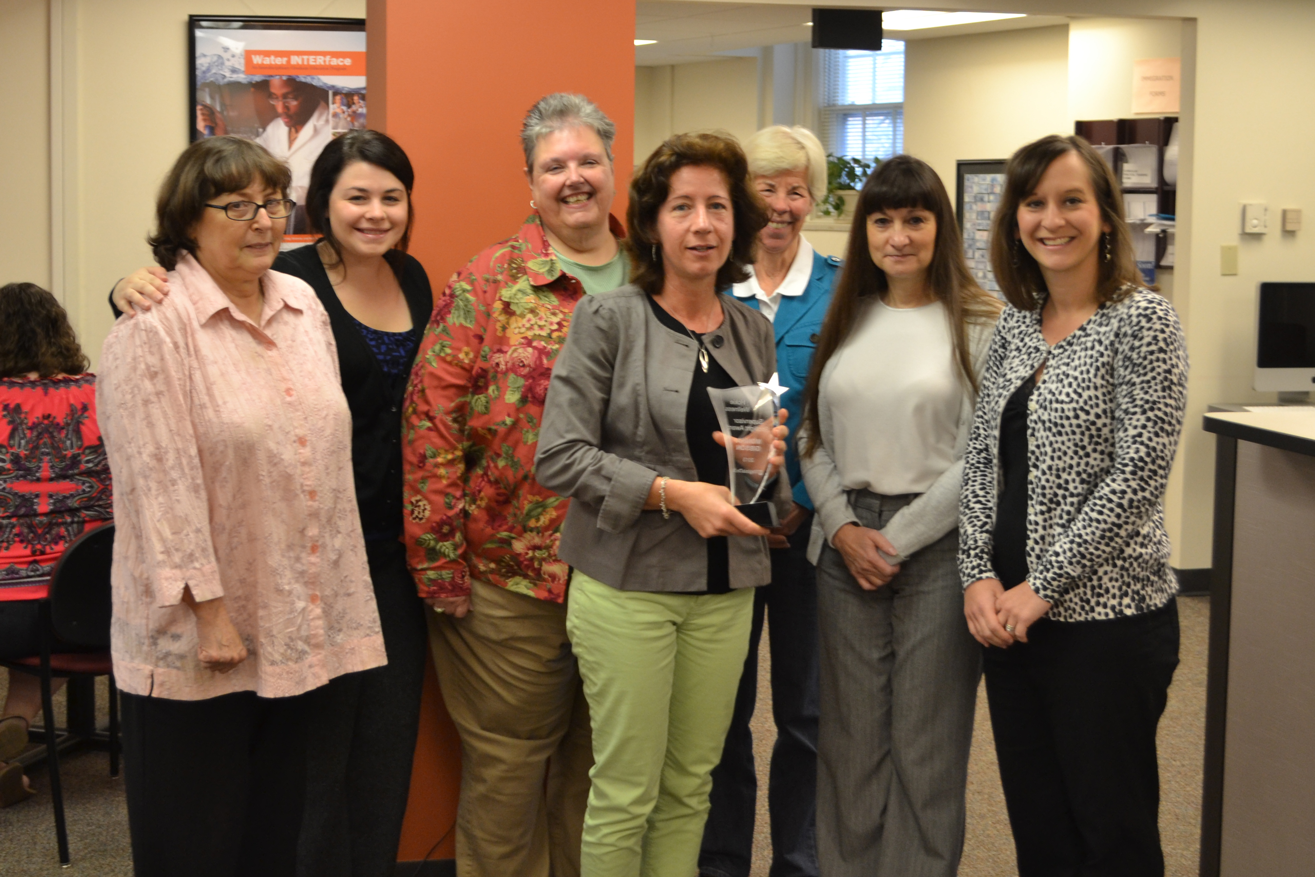 Monika Gibson, Supervisor Spotlight Award winner, stands with her team at the Graduate Life Center at Donaldson Brown. From left to right: Pat Goodrich, Nicky Bertone, Zelma Harris, Monika Gibson, Ruth Athanson, Tina Lapel, Lauren Surface.