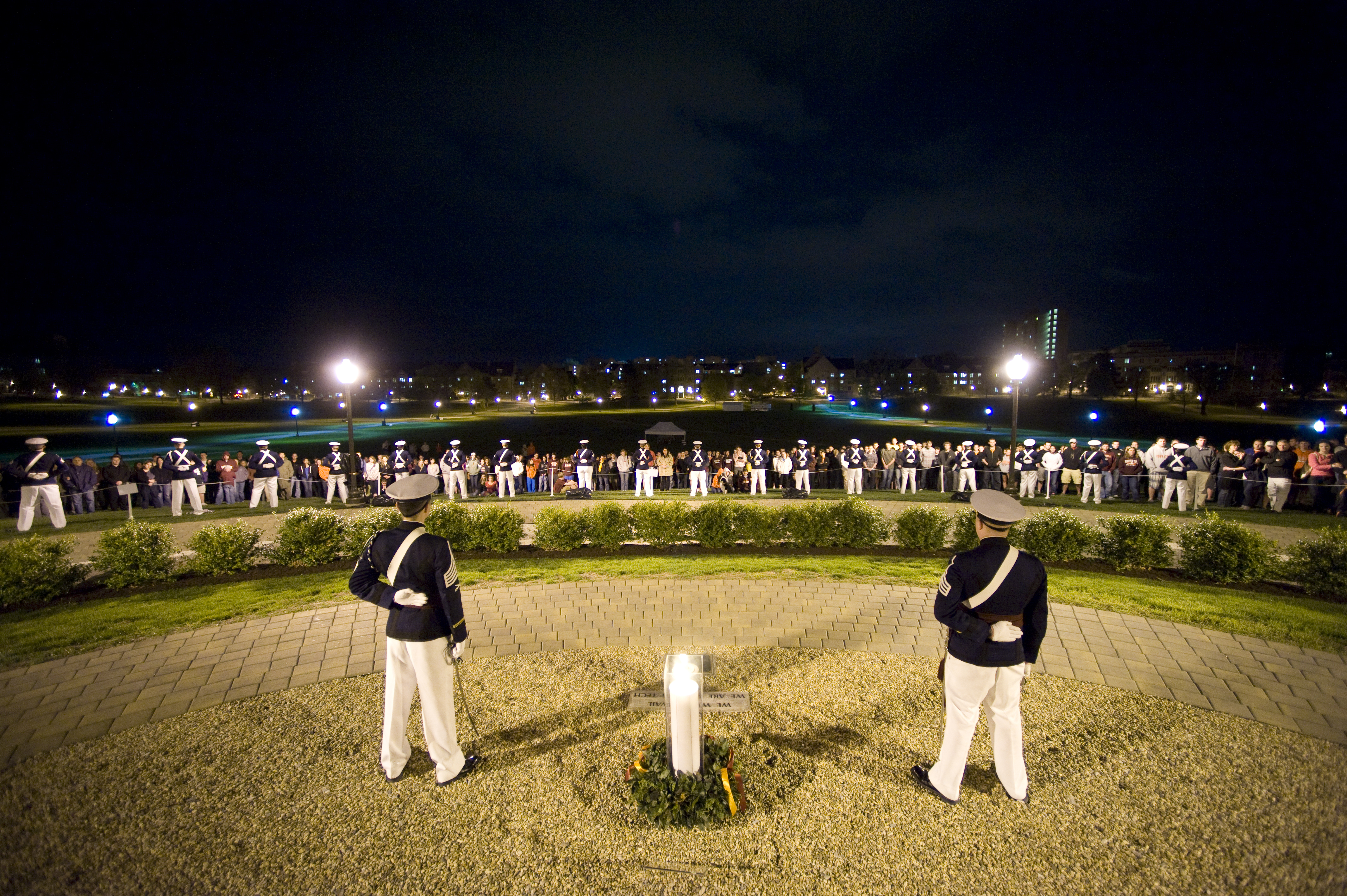 Cadets standing watch during ceremonial candle lighting