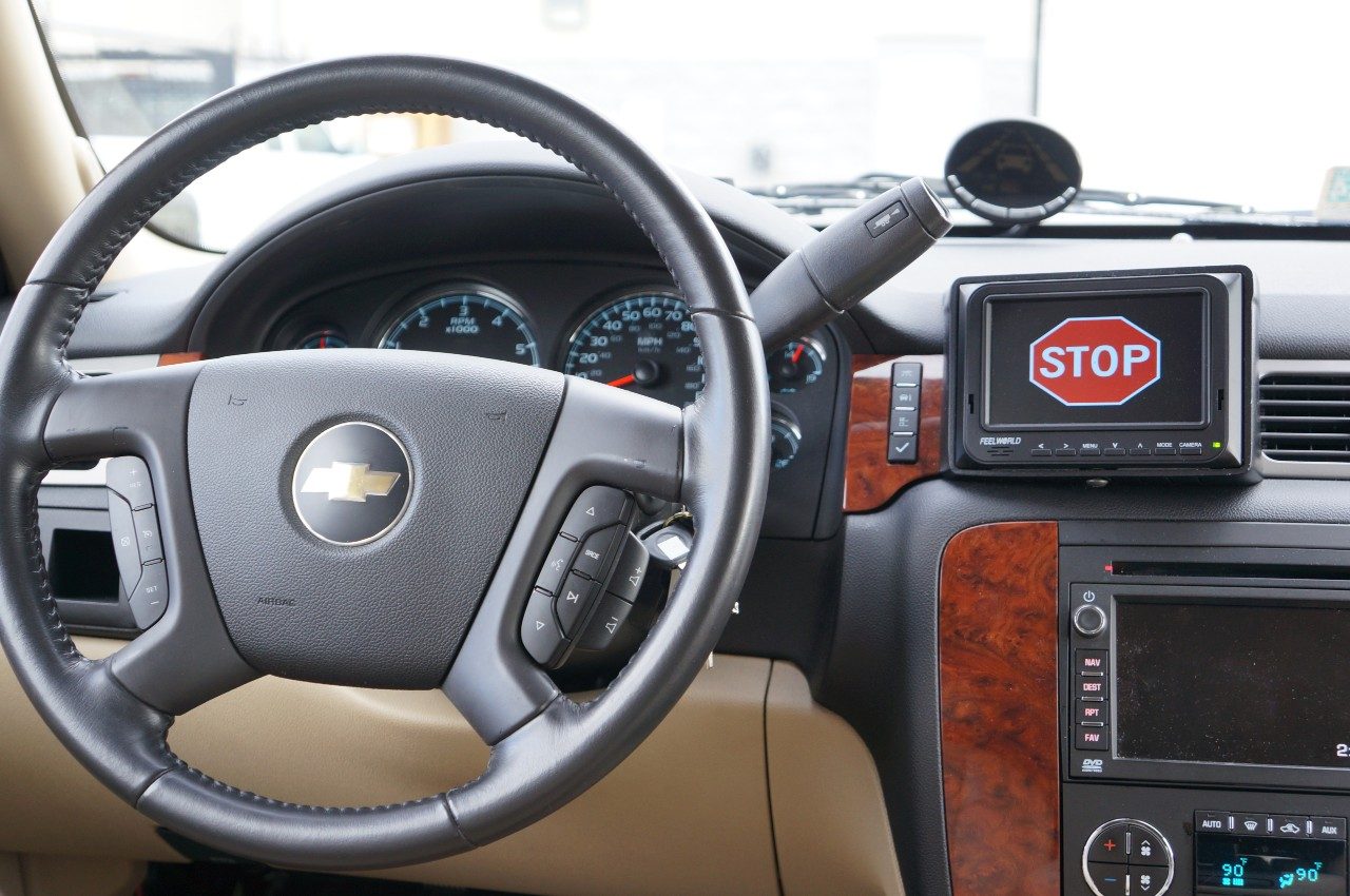 During the Adaptive Stop Yield Study, participants saw a stop sign display on their dashboard as part of traffic instruction, as well as a yield sign. The study seeks to bring traffic signs inside cars that use connected vehicle technology, rather than relying on physical posts signs that can be damaged, aged, or removed. The study, now in a proof of concept, was funded by the U.S. Department of Transportation.