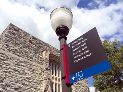 New navigation sign outside of Pamplin Hall