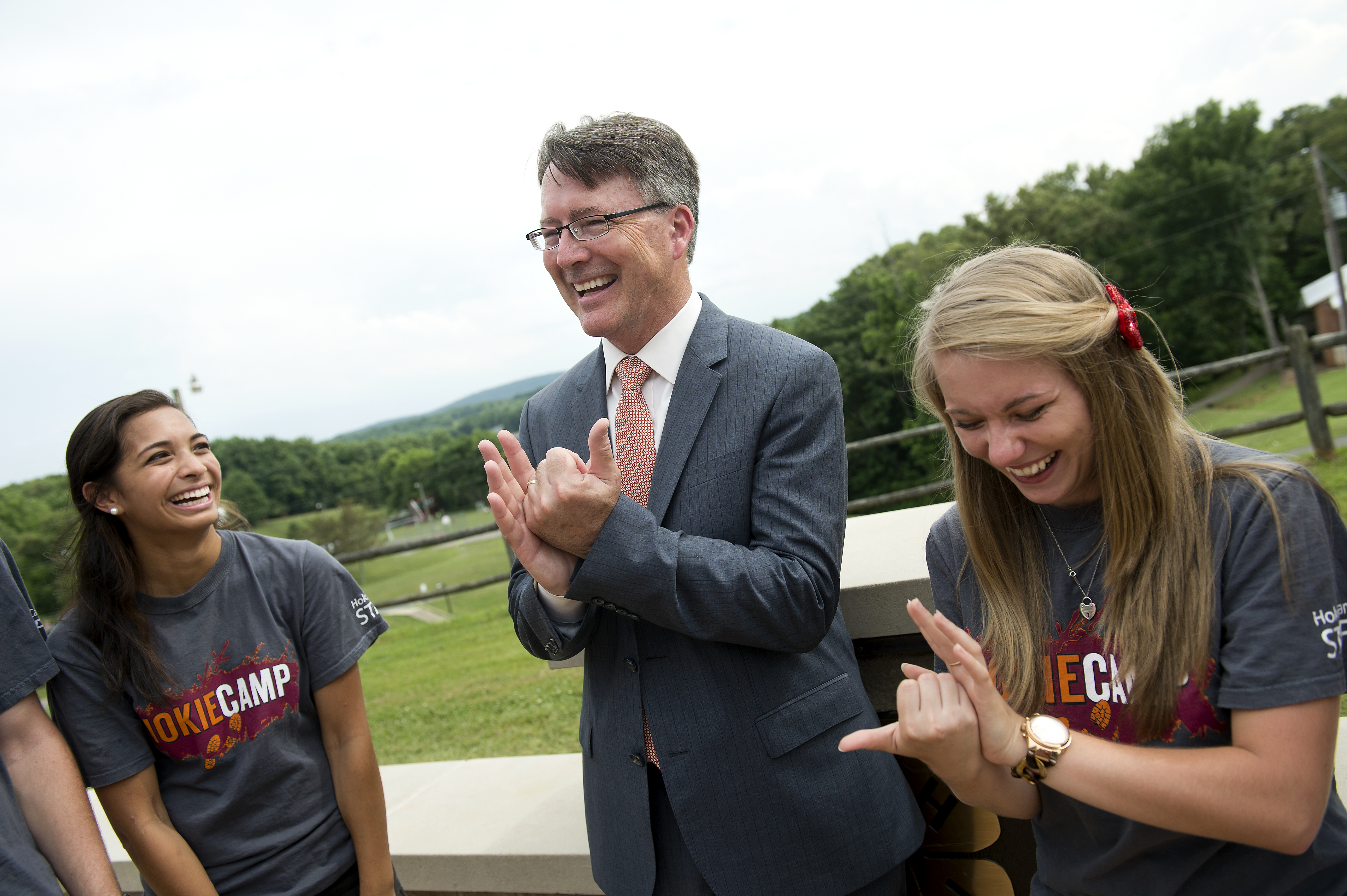 President Sands with two students