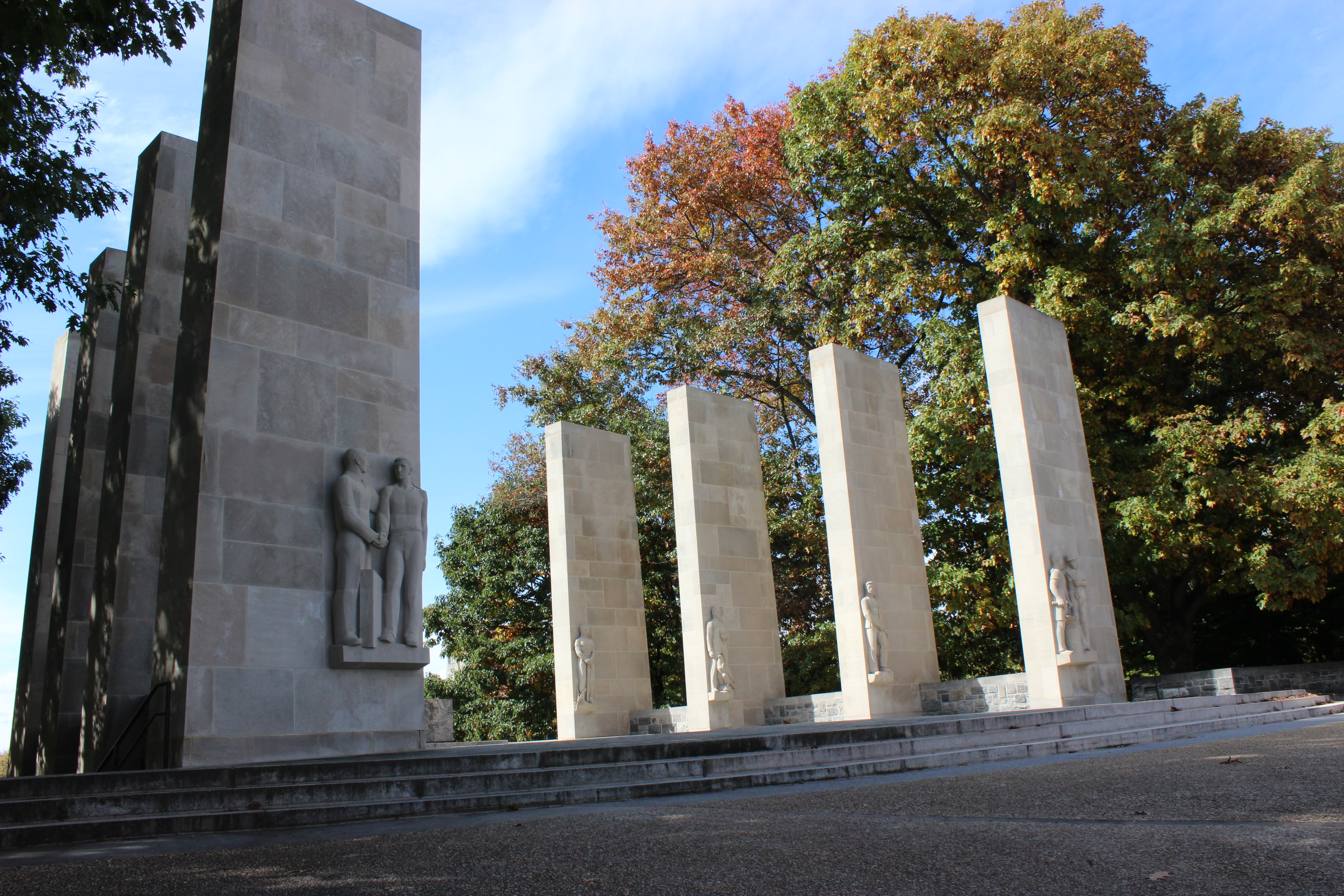 Students visit the pylons on a fall afternoon