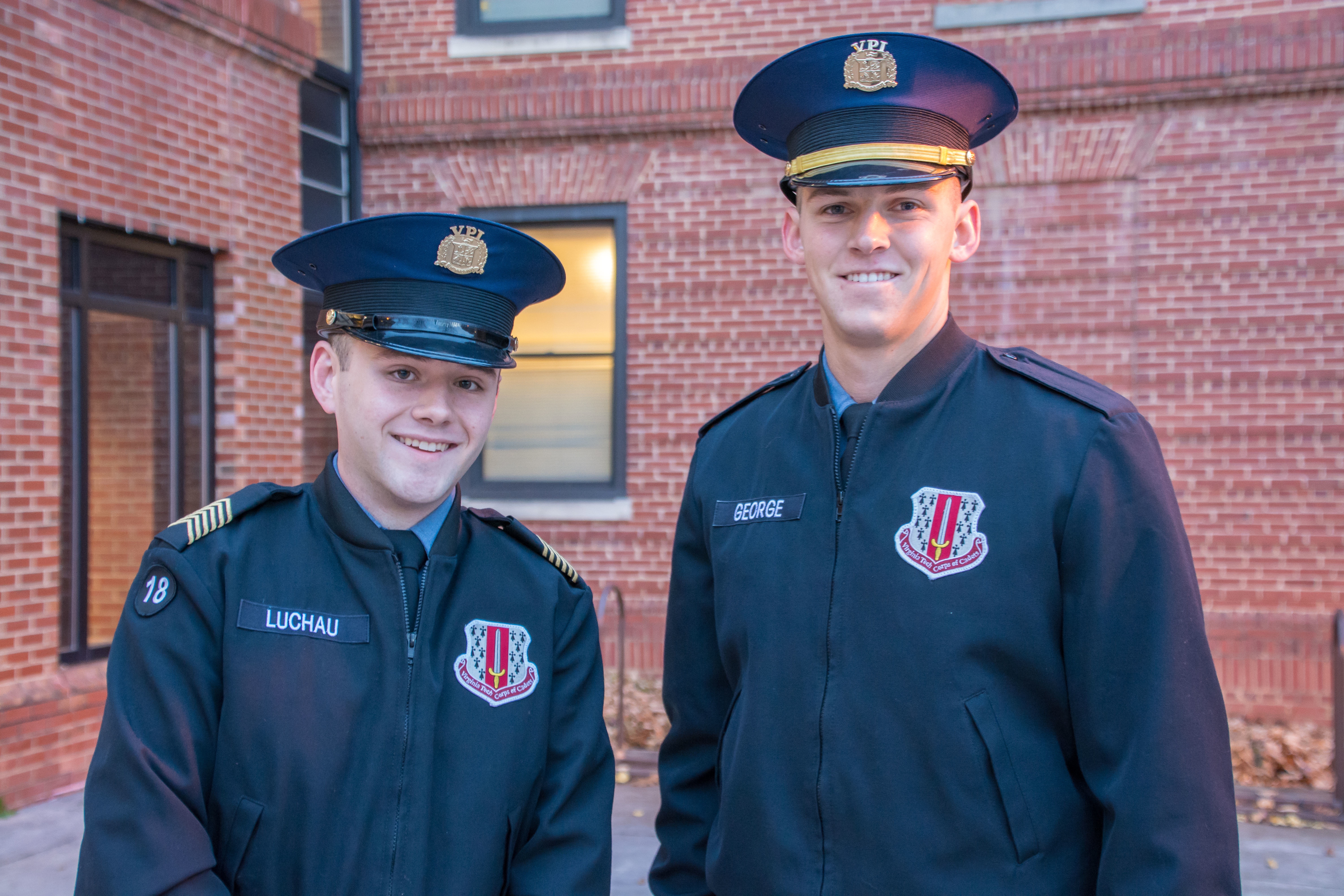 From left to right are Cadet Donald Luchau and Cadet Andrew George on teh Upper Quad.