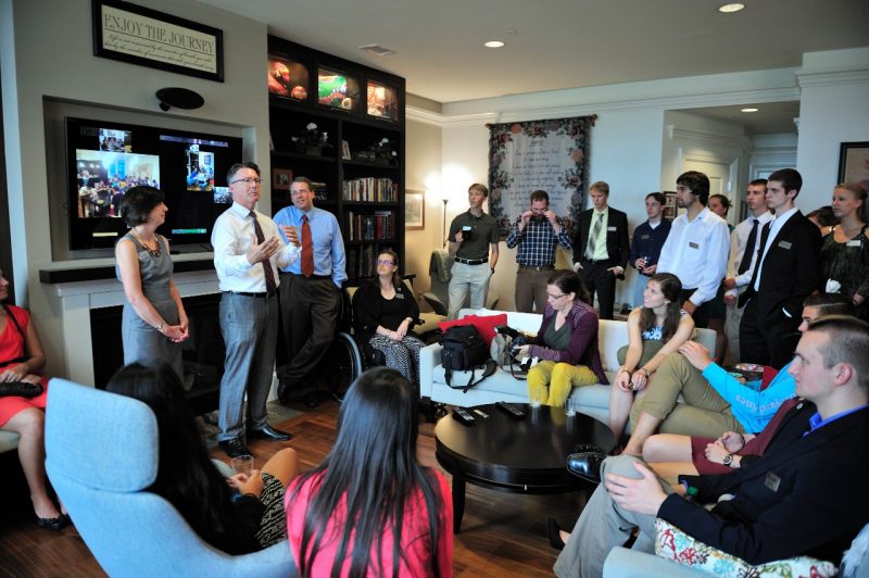 President Sands visits with honors students in the home of the faculty principal.