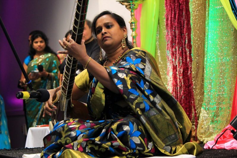 Madhuri Sankuri, wife of an MBA student, plays the sitar at the International Festival of Light.