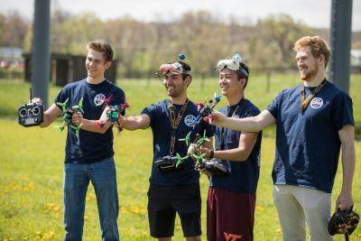 The Virginia Tech drone racing team shows off their aircraft, which zipped around inside the net near the conclusion of the ceremony. The drone park gives the top-ranked team a place to practice without having to rent indoor gym space.  
