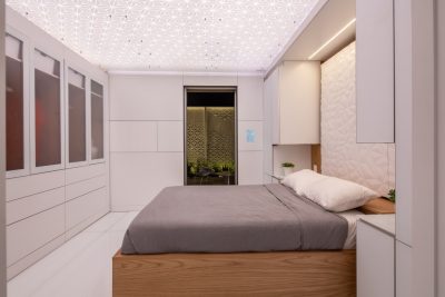 The bedroom features a Murphy bed to maximize the house's space. The smart bed itself can monitor quality of sleep and automatically adjust for the user. (Photo by Erik Thorsen)