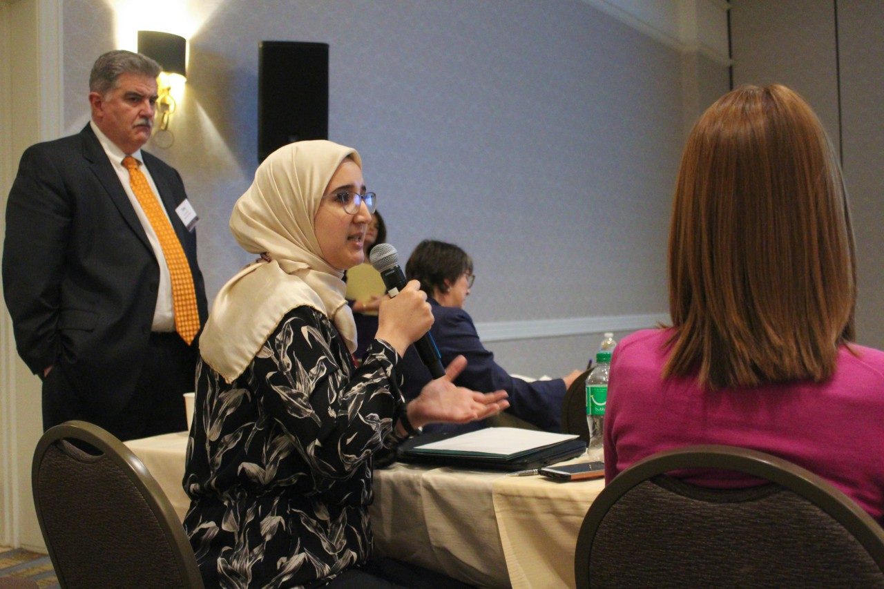 Khadijah Rouchdi asks a question from the audience.