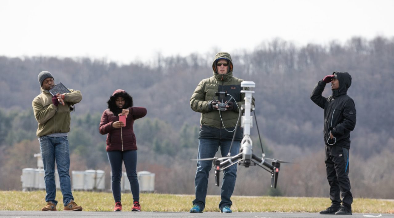 Drone wind studies at the Kentland Experimental Aerial Systems laboratory. From left to right: Bryan Bloomfield, Milan Tisdale, David Schmale, and Trent Malone. Photo credit: Peter Means
