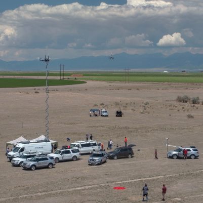 Calibration experiments in Colorado to compare ground-based and drone-based meteorological measurements. Such measurements can be used to predict the transport of hazardous agents in the atmosphere.  Photo courtesy of David Schmale.