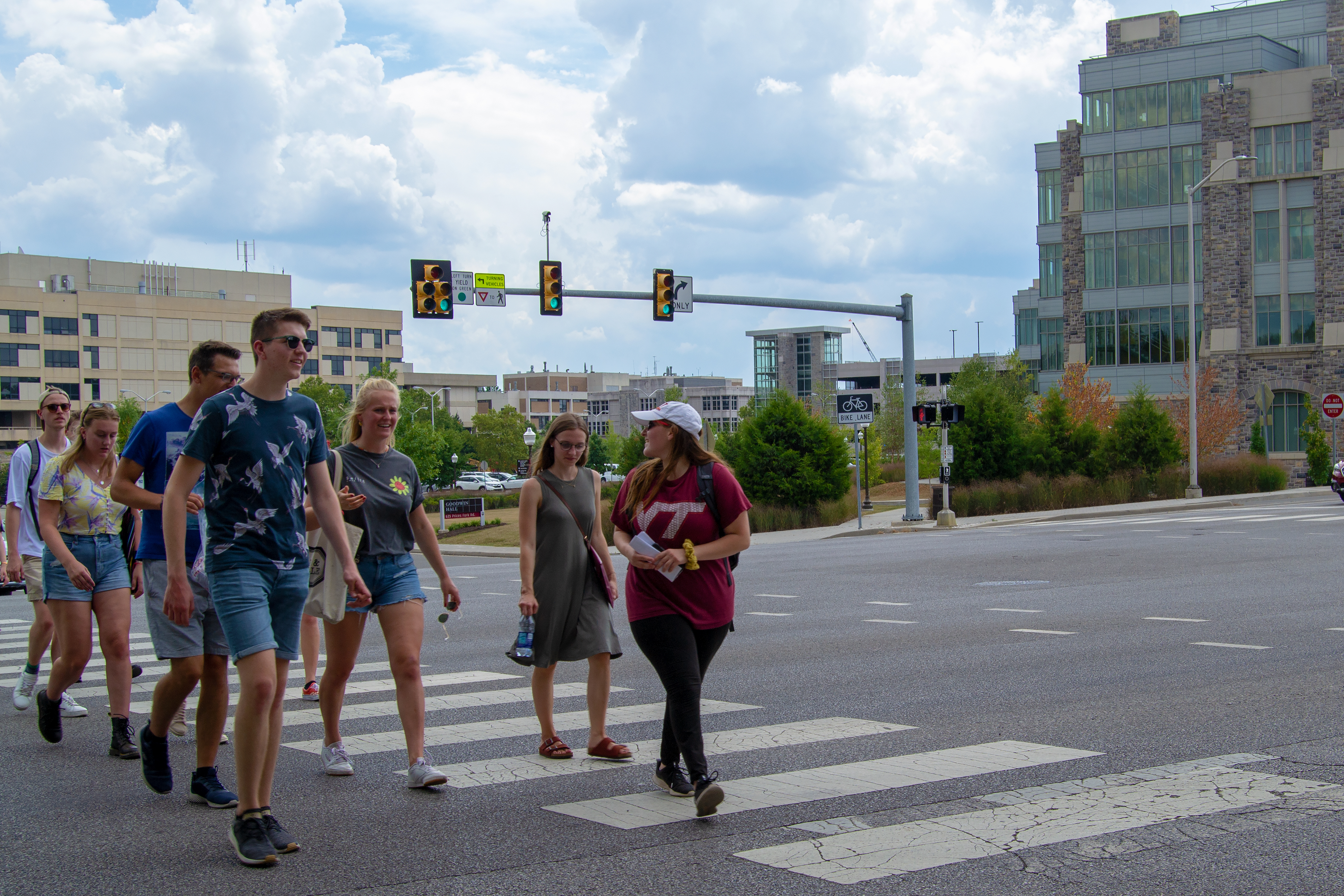 Shelly Worek (center wearing a Virginia Tech shirt) leads a group of international exchange students on a campus tour.