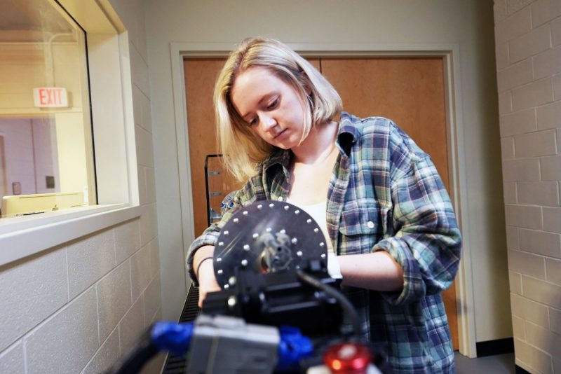 Gwyn Schloer works on an automated wire harness project for her senior design project, sponsored by Northrup Grumman. 