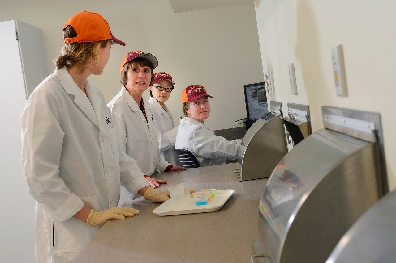 Susan Duncan and her students in her food sensory lab.