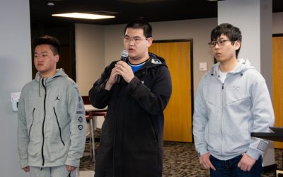 Three students pitching their business idea at the Apex Center