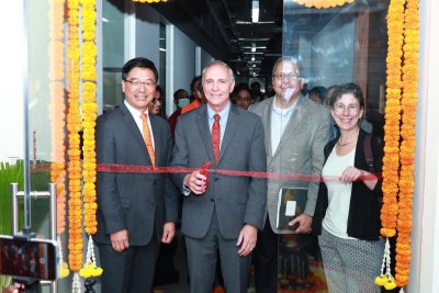 Dan Sui, Cyril Clarke, Guru Ghosh, Amiee Surprenant cut a ribbon  inaugurating Virginia Tech's newest office in India