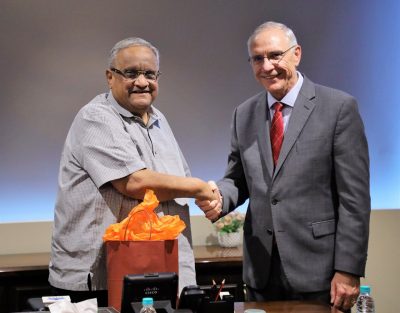 Amrish Patel, Chancellor of SVKM's NMIMS, and Cyril Clarke, VT Provost exchange gifts