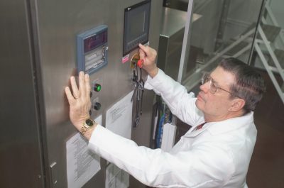George Flick operates the High Pressure Processing equipment in the Department of Food Science and Technology.