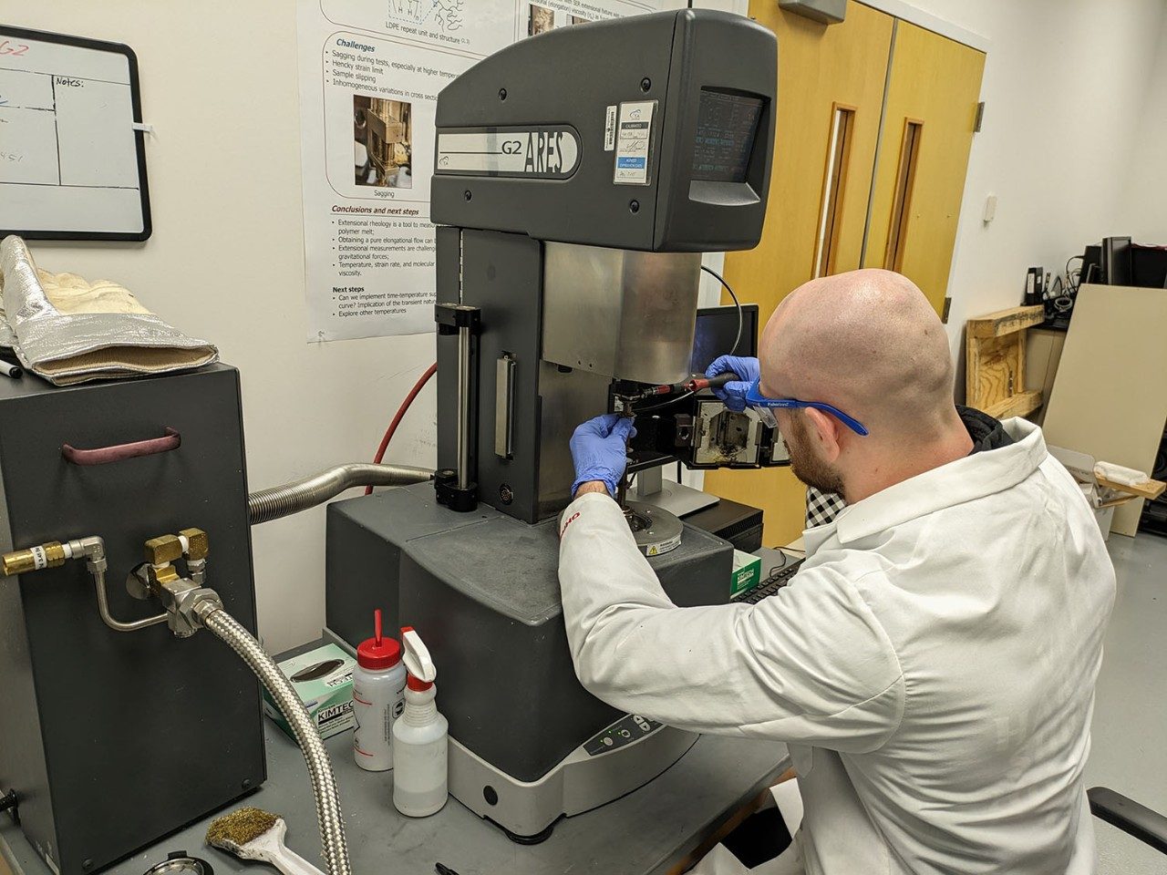 Polymer Composite and Materials Laboratory manager John Reynolds uses a rheometer to measure the viscoelastic properties of relevant materials for processing. Photo courtesy of Ray Peterson. 