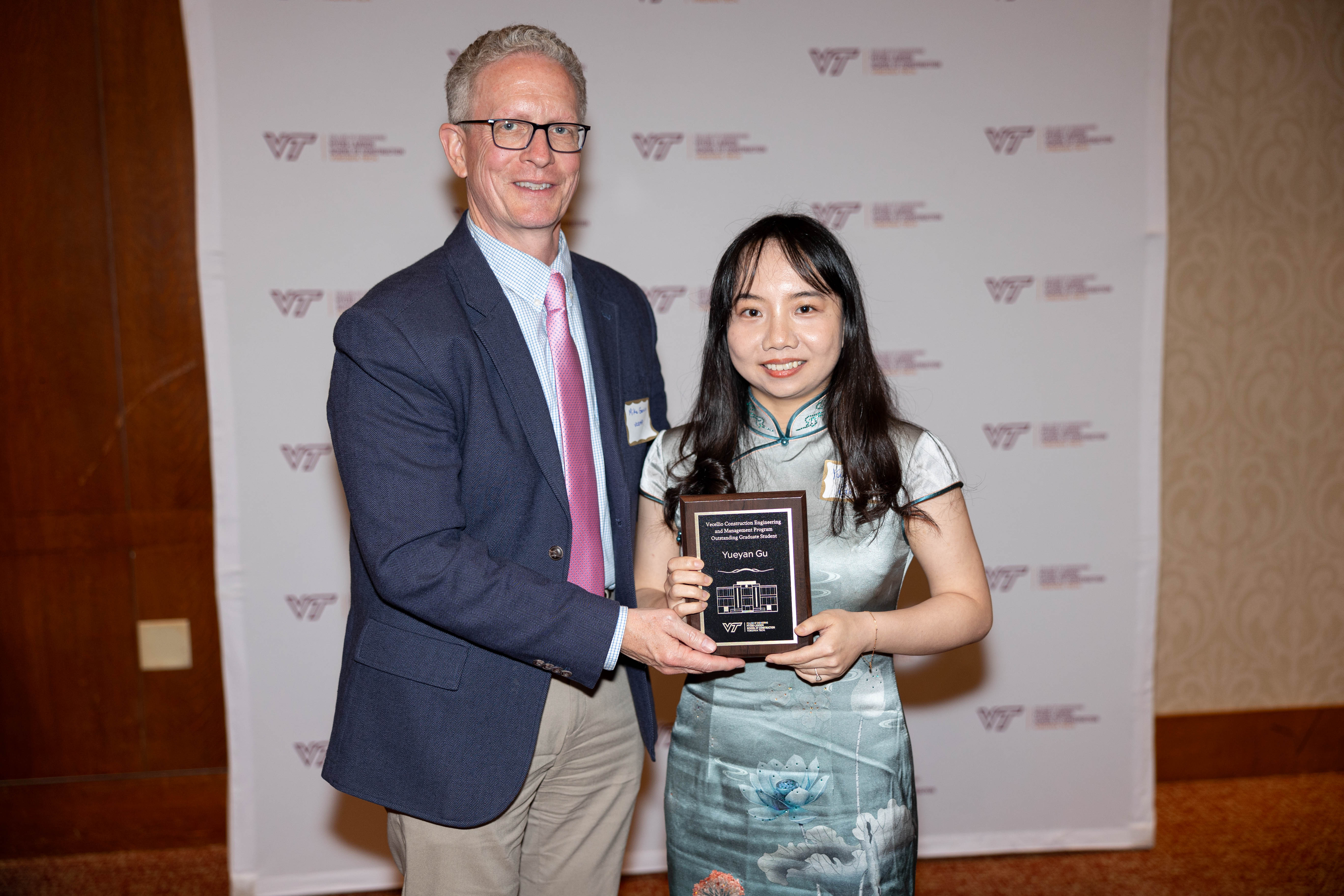 Michael Garvin (at left) with Yueyan Gu. Photo by Will Drew for Virginia Tech.