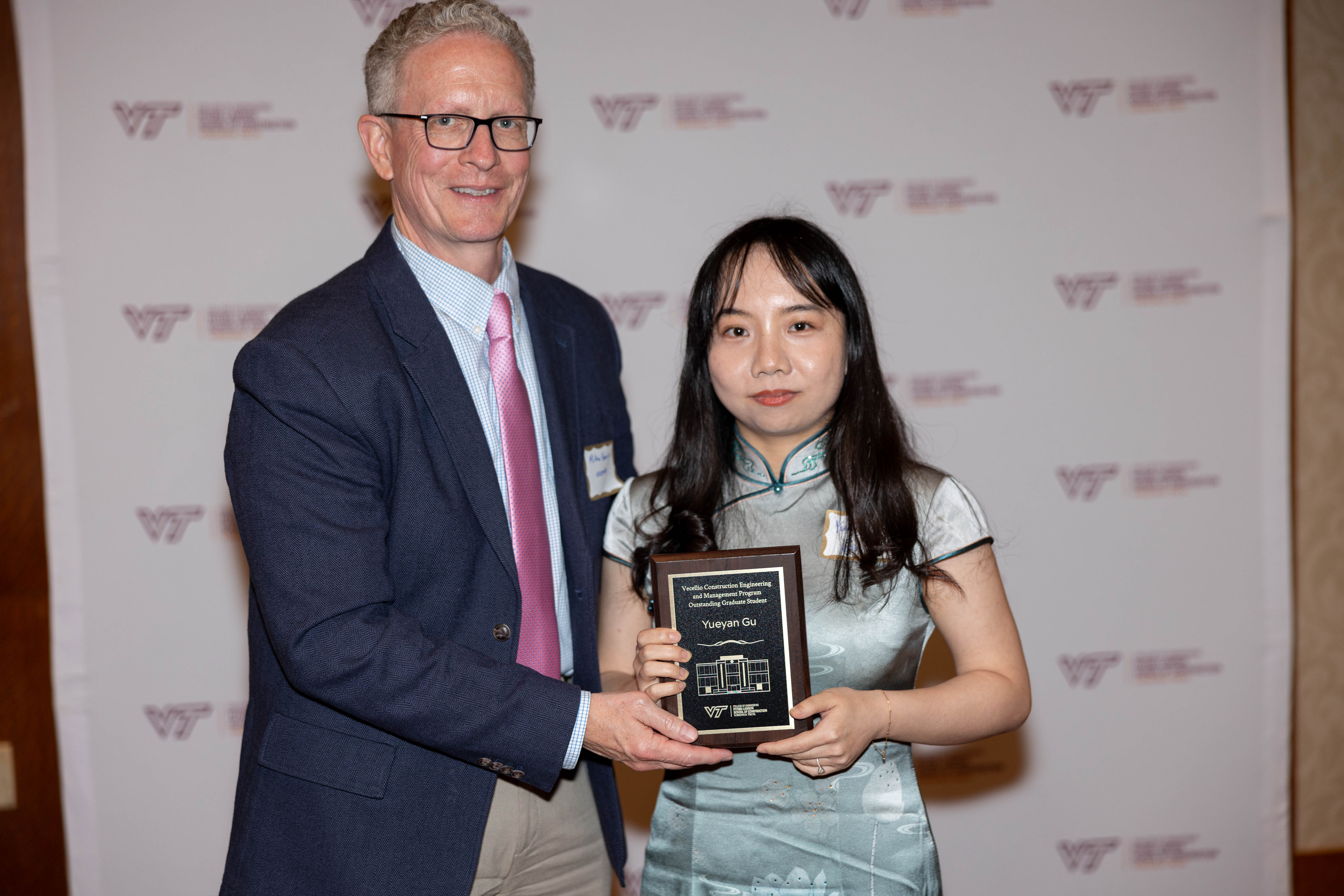 Michael Garvin (at left) with Yueyan Gu. Photo by Will Drew for Virginia Tech.