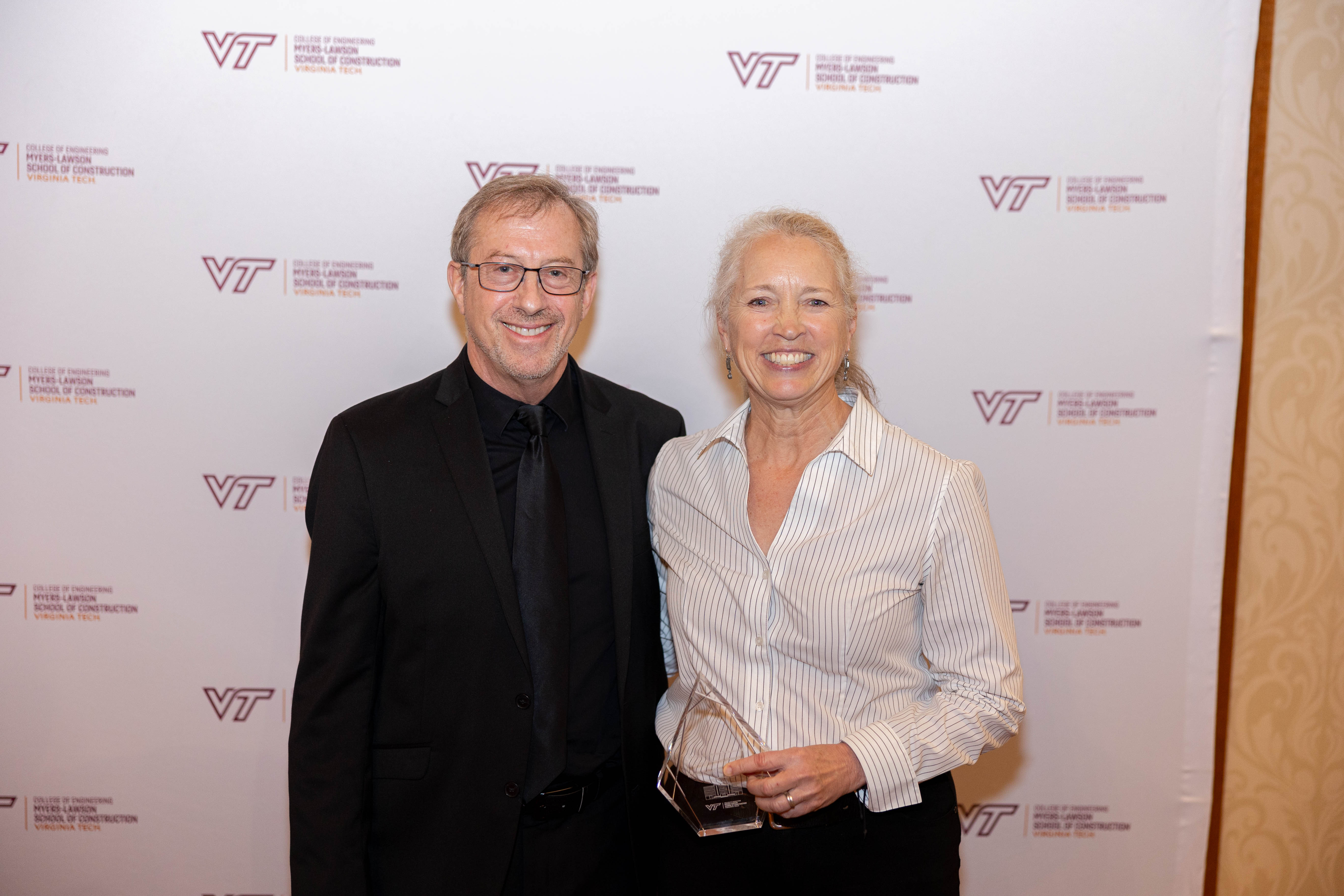 Brian Kleiner (at left) and Kirsten Leckszas '88. Photo by Will Drew for Virginia Tech