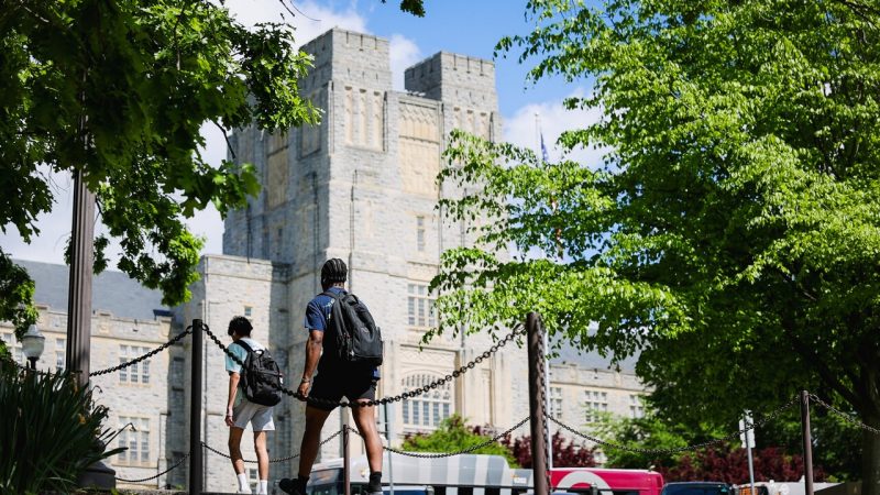 Photograph of students walking near Virginia Tech's Burruss Hall in spring 2024. Taken by Luke Hayes for Virginia Tech.