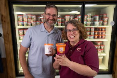 Virginia Tech Food Science faculty members Joell Eifert and Brian Wiersema pose with the containers of ice cream they helped develop