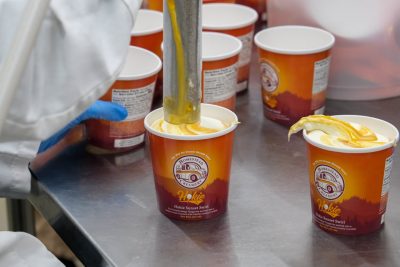 Pints of Hokie Sunset Swirl are filled on the production line