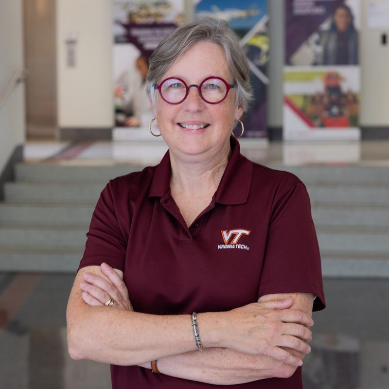 Mary Kasarda poses for photo in Kelly Hall