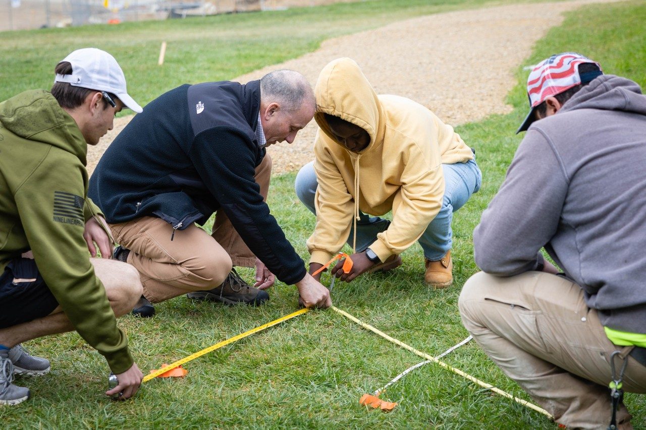 Students learn rudimentary math calculations used for surveying during Blacksburg class time. Photo by Connor Hetman for Virginia Tech. 