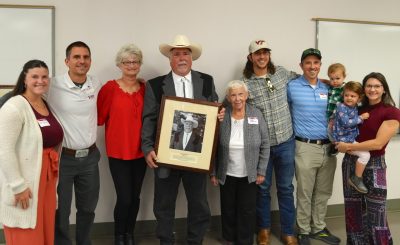 Mark Estienne poses with his family.