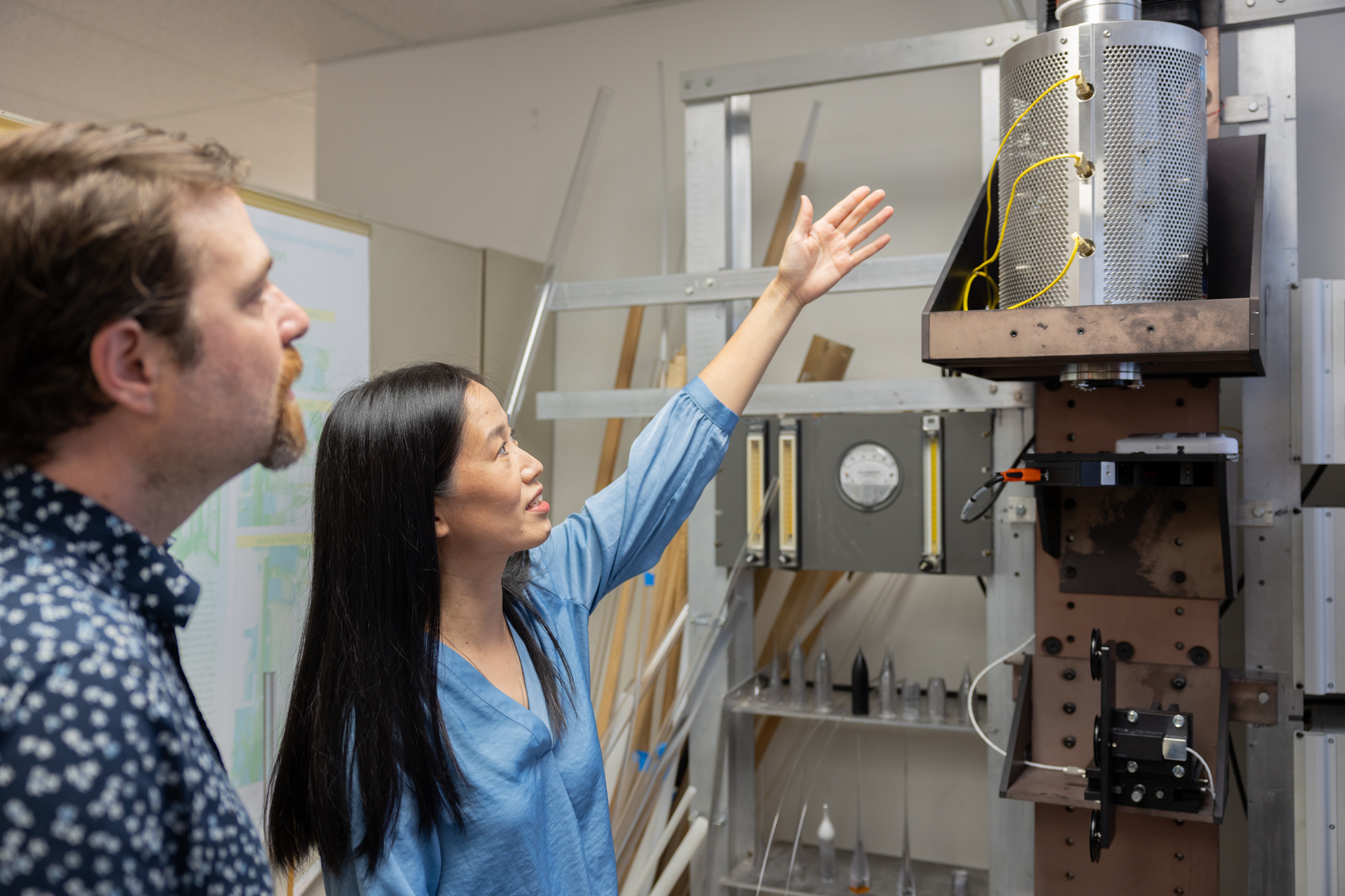 Two Virginia Tech faculty work in the Center for Photonics Lab.