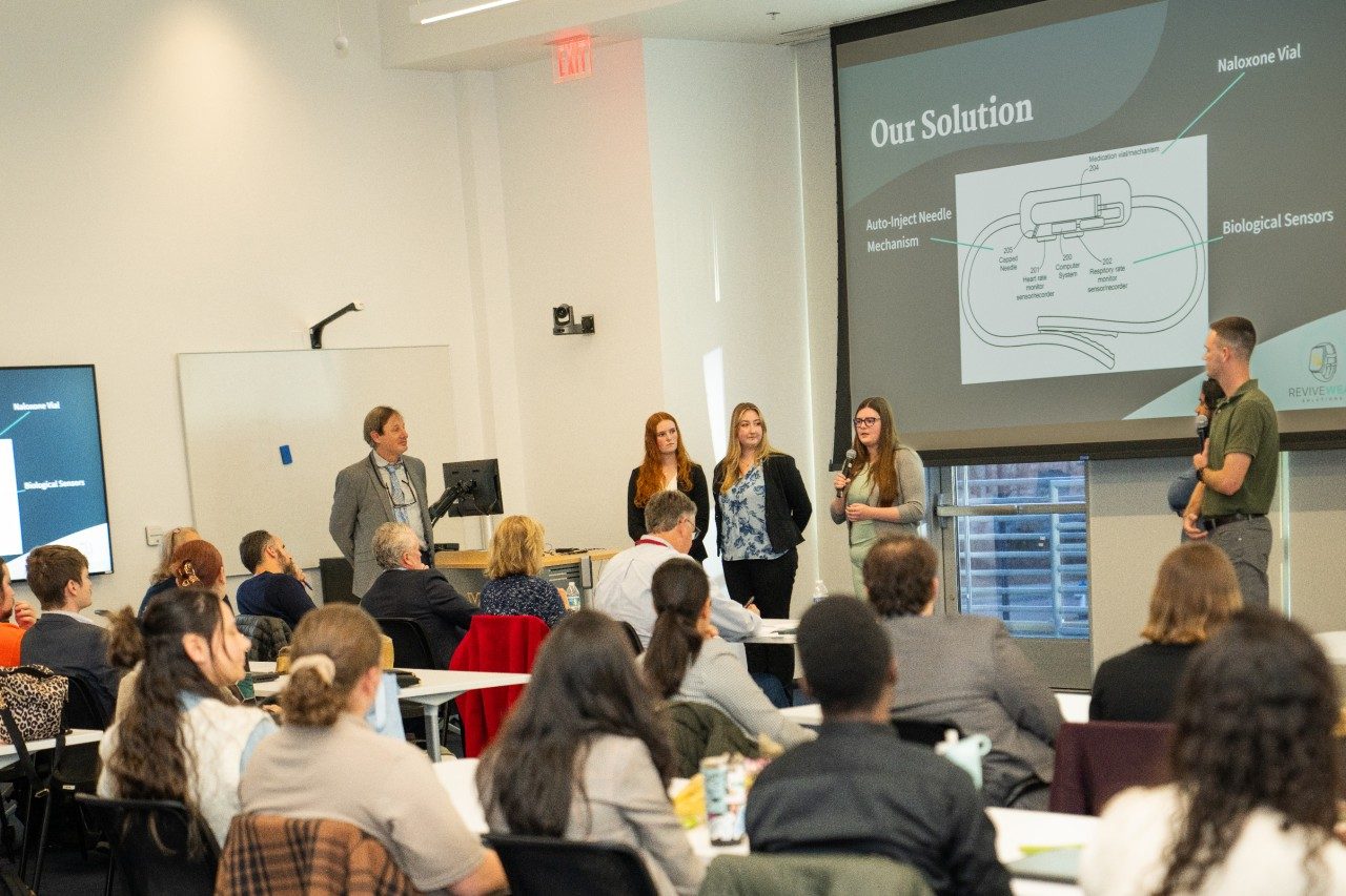 Standing beside Rob Gourdie (left) are team members Sarah Dietz, Samantha Edwards, May Kretzer, Masum Billah, and Warren Thiel.