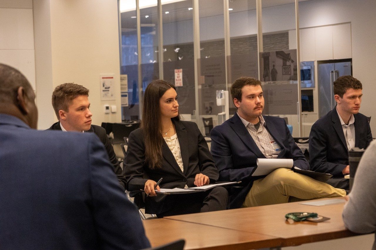 A group of students at a table.