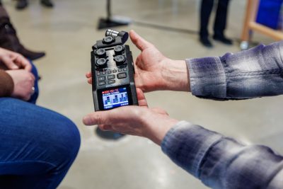 Eric Lyon holds a portable audio recorder during the workshop “Spatial Sound” in the Expressions Lab at Amazon HQ2. Photo by Craig Newcomb for Virginia Tech.