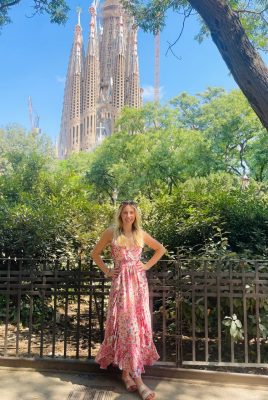 During her study abroad experience, Elizabeth Hill poses in front of the La Sagrada Familia in Barcelona, Spain