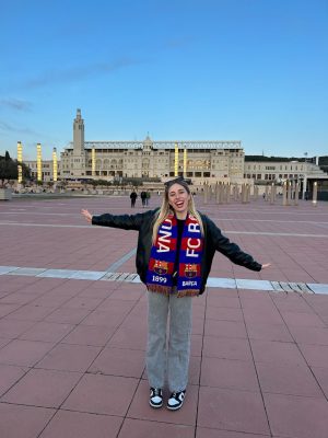 During her study abroad experience, Elizabeth Hill poses in front of the Estadi Olímpic in Barcelona, Spain