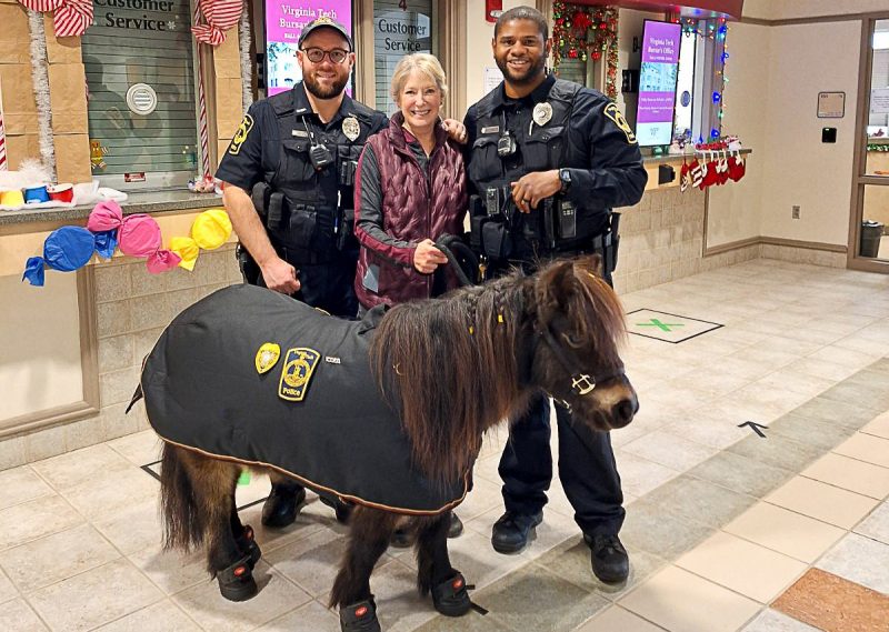 Ringo the Patrol Pony with owner, Leslie Greggs, and Virginia Tech Police Officers Jamal Jackson and Eric McDearis