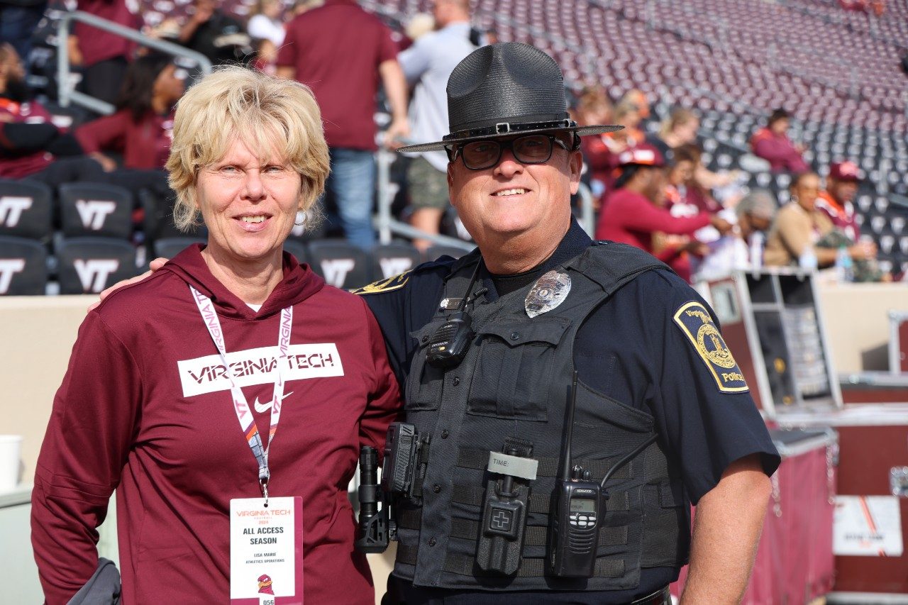 Corporal John Tarter on the field posing for a picture.